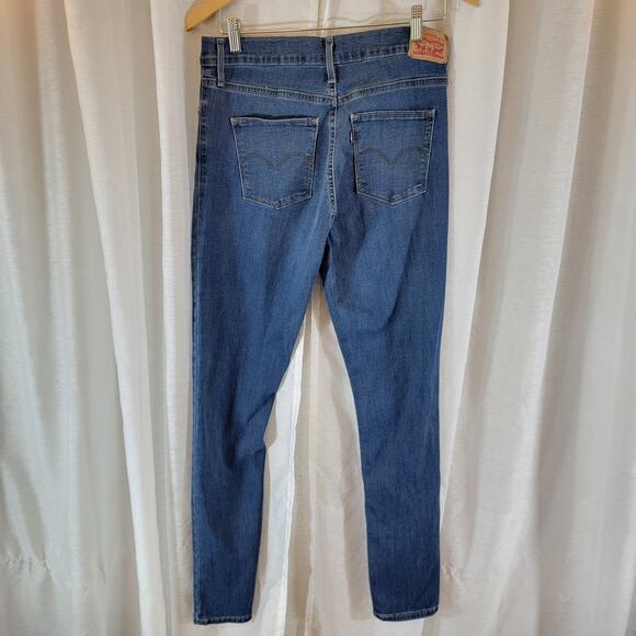Levi’s Slimming Skinny Women’s Jeans Size 31 Blue Denim Mid Rise - Picture 2 of 5
